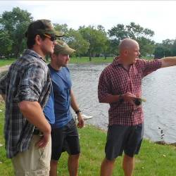 Water center team dicusses their plan of action for addressing deceased fish at Lakeside country club
